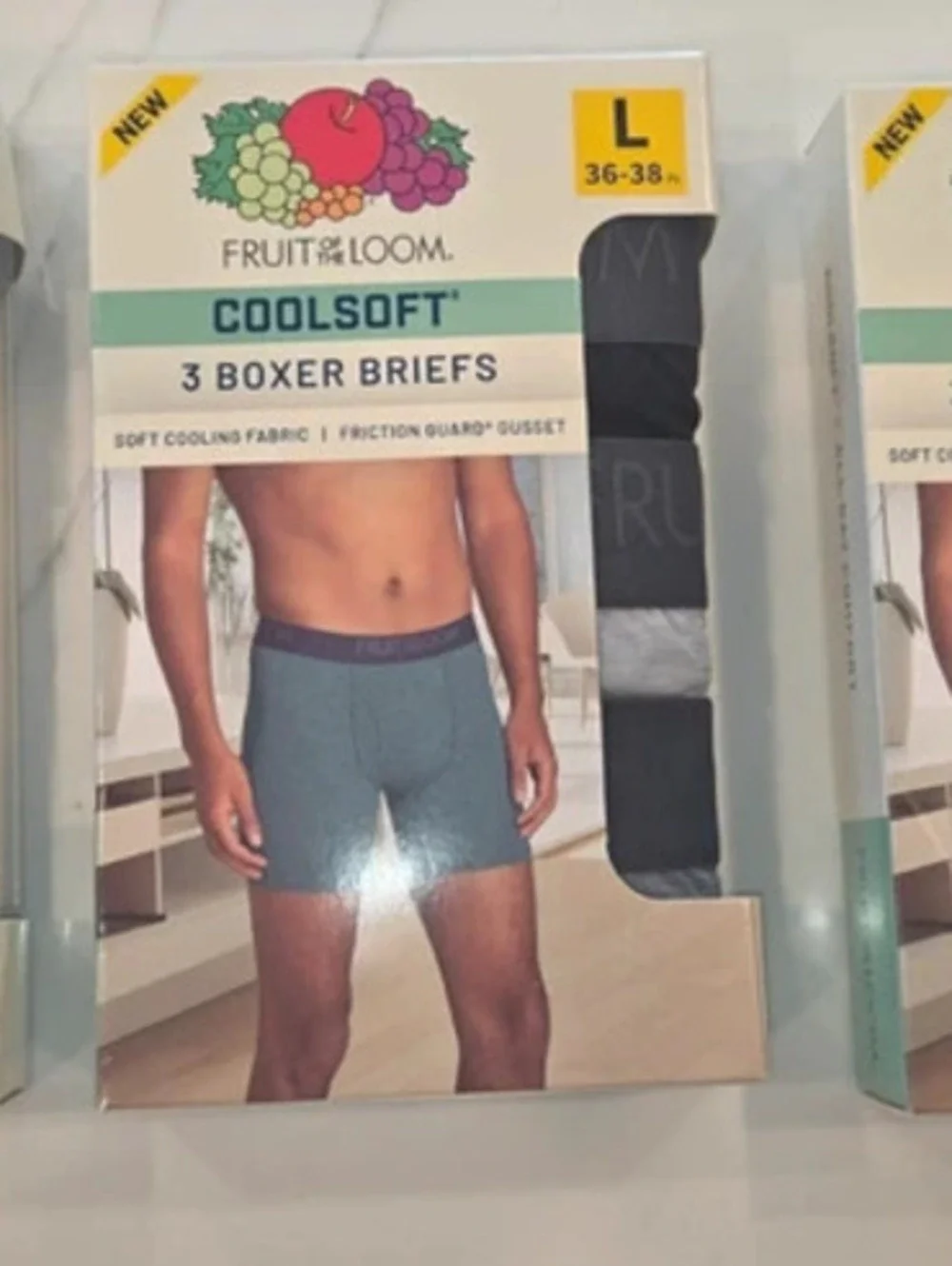 9 pairs of Fruit of the Loom boxer briefs, size large.